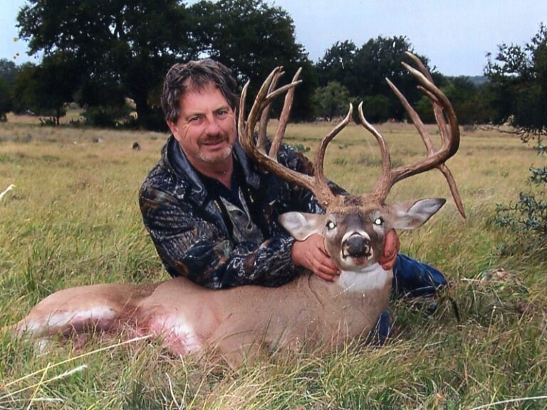 Hunter with a harvested buck, a J's Deer & Wild Game Processing customer in San Angelo, Texas