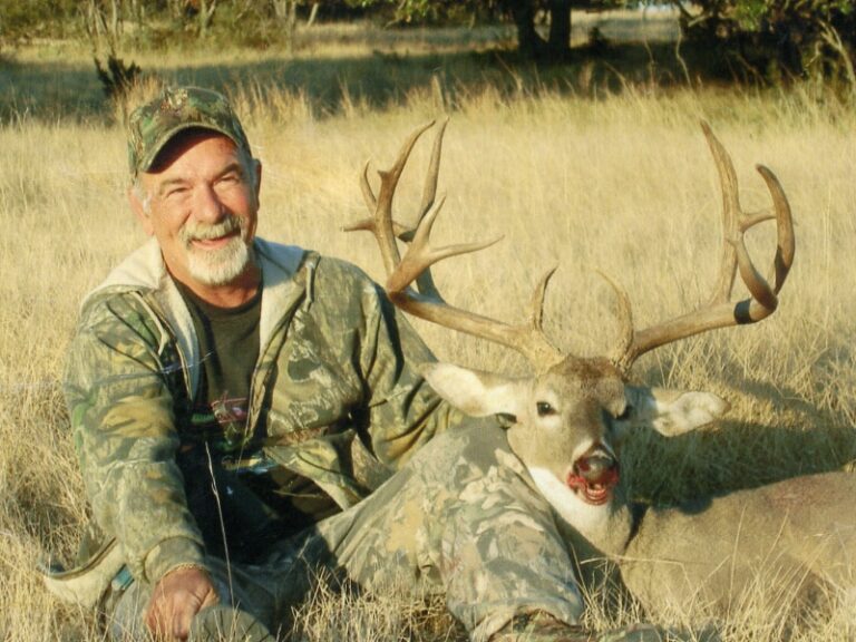 Hunter with a harvested buck, a J's Deer & Wild Game Processing customer in San Angelo, Texas