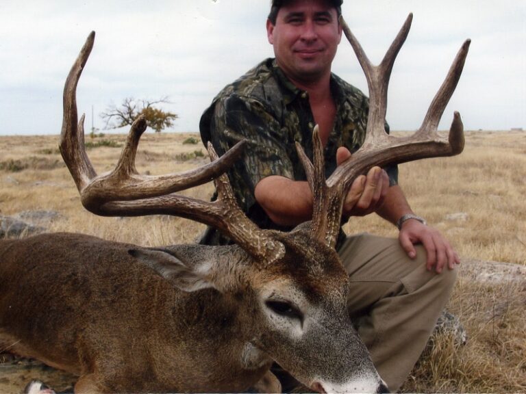 Hunter with a harvested buck, a J's Deer & Wild Game Processing customer in San Angelo, Texas