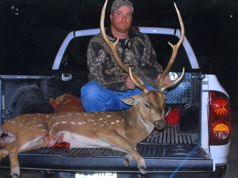 Hunter with a harvested buck, a J's Deer & Wild Game Processing customer in San Angelo, Texas