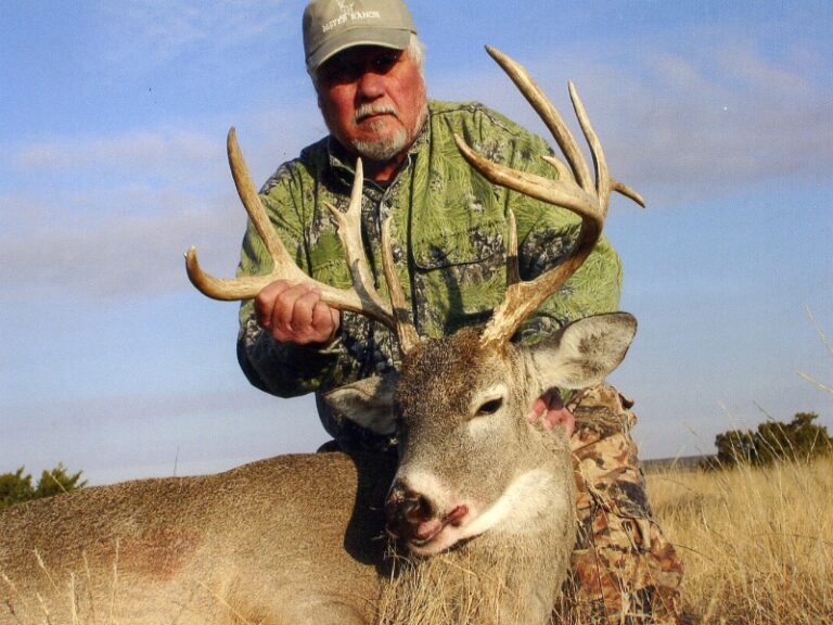 Hunter with a harvested buck, a J's Deer & Wild Game Processing customer in San Angelo, Texas