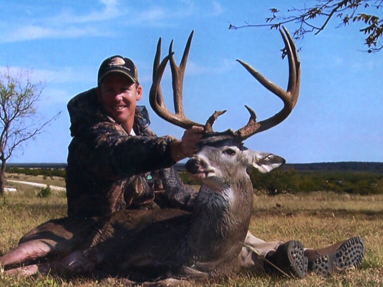 Hunter with a harvested buck, a J's Deer & Wild Game Processing customer in San Angelo, Texas